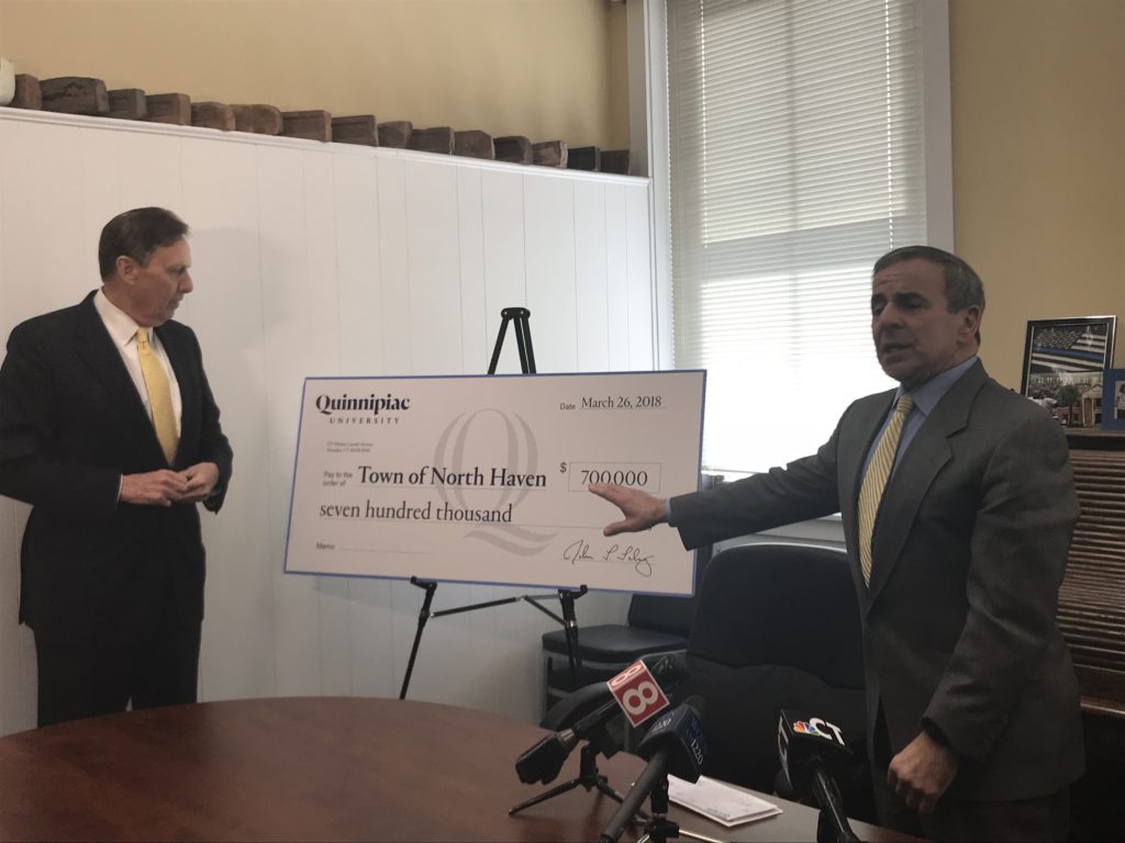 Quinnipiac presents North Haven with a check for $700,000