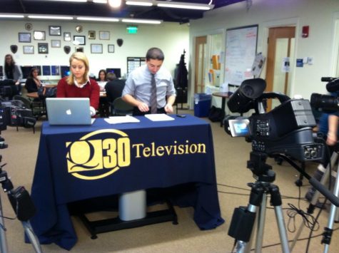 Q30 News live in the media suite with Collen Elizabeth and Nick Frias
