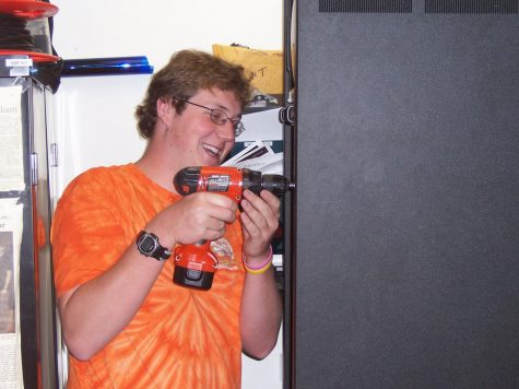 2006- Installing new equipment in the Q30 office in student center